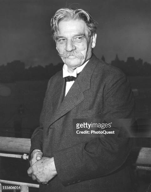Portrait of German-born French medical missionary and theologian Dr. Albert Schweitzer as he stands on the deck of the ocean liner SS Nieuw...