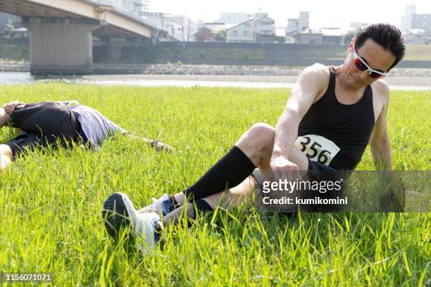 senior man resting after sports race - live finale stock pictures, royalty-free photos & images