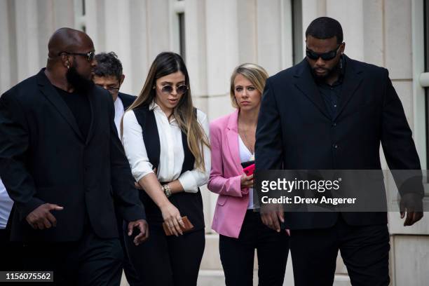 Emma Coronel Aispuro, wife of Joaquin "El Chapo" Guzman, is escorted by security as she leaves federal court, July 17, 2019 in the Brooklyn borough...