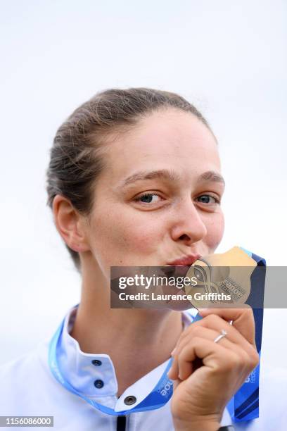 Mallory Franklin of Great Britain kisses her Gold Medal after winning the Womens K1 Final during Day Two of the 2019 ICF Canoe Slalom World Cup at...