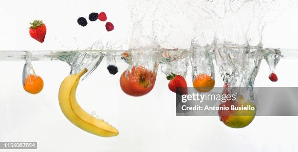 food splashing in the water - refresh stock pictures, royalty-free photos & images