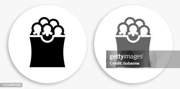 pop corn black and white round icon - popcorn white background stock illustrations