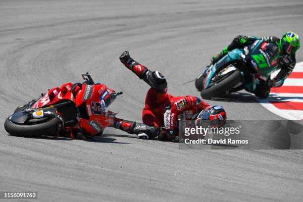 Danilo Petrucci of Italy and Mission Winnow Ducati crashes during the MotoGP Qualifying ahead of MotoGP Gran Premi Monster Energy de Catalunya at...
