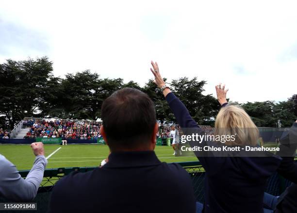 Dan Evans of Great Britain celebrates as well as his team after he wins the first set during his Men's Quarter Final match against Dominik Koepfer of...