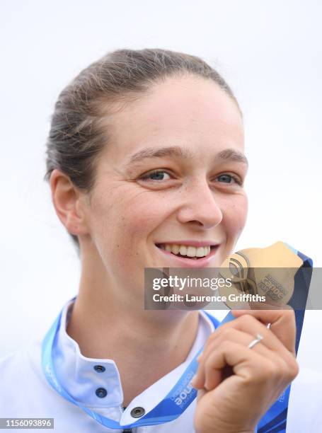 Mallory Franklin of Great Britain shows off her Gold Medal after winning the Womens K1 Final during Day Two of the 2019 ICF Canoe Slalom World Cup at...