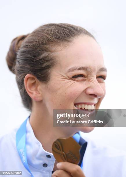 Mallory Franklin of Great Britain shows off her Gold Medal after winning the Womens K1 Final during Day Two of the 2019 ICF Canoe Slalom World Cup at...