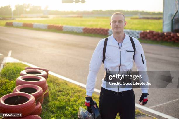 race car driver - racing suit stock pictures, royalty-free photos & images