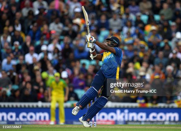 Thisara Perera of Sri Lanka plays a shot during the Group Stage match of the ICC Cricket World Cup 2019 between Sri Lanka and Australia at The Oval...