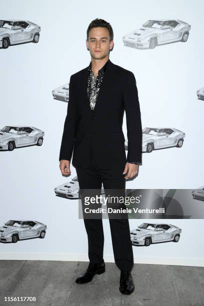 Brandon Flynn attends the Versace fashion show during the Milan Men's Fashion Week Spring/Summer 2020 on June 15, 2019 in Milan, Italy.