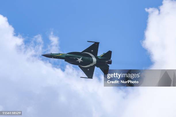 Thunder multirole combat aircraft, a fighter jet made in China and Pakistan. The Pakistani plane is painted with the country's flag as it belongs to...