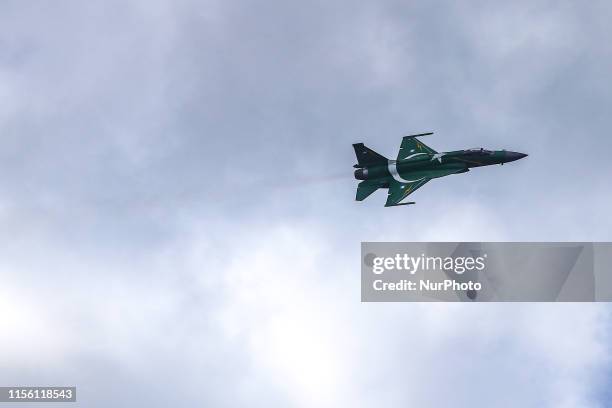 Thunder multirole combat aircraft, a fighter jet made in China and Pakistan. The Pakistani plane is painted with the country's flag as it belongs to...