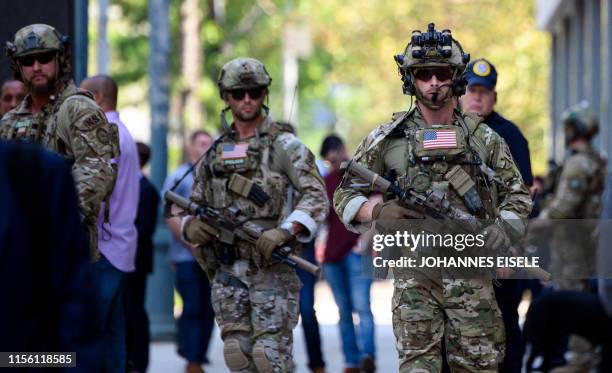Marshal security police stand out at the Brooklyn Federal Court on July 17 after Mexican drug lord Joaquin "El Chapo" Guzman's sentencing, in New...