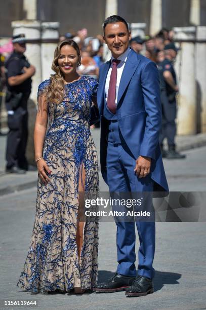 Keylor Navas and wife Andrea Salas attend the wedding of real Madrid football player Sergio Ramos and Tv presenter Pilar Rubio at Seville's Cathedral...