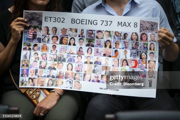 Tor Stumo, who lost his sister Samya Stumo in the Ethiopian Airlines Flight 302 crash, holds a board with photos of the other crash victims during a...