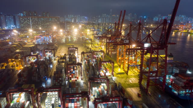 Hongkong Aerial Drone Hyper Time Lapse at Container Terminals and Stonecutters bridge at Night