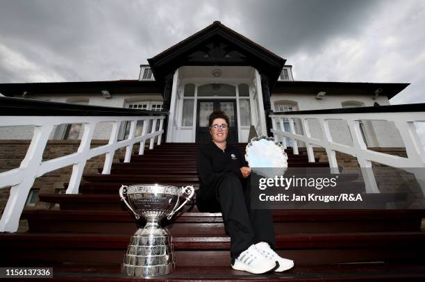 Emily Toy of England poses with the trophy following victory during the final match on day five of the R&A Womens Amateur Championship at Royal...