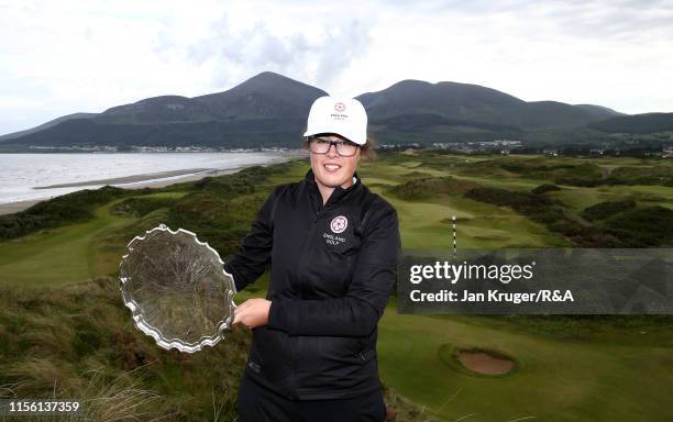 Emily Toy of England poses with the trophy following victory during the final match on day five of the R&A Womens Amateur Championship at Royal...