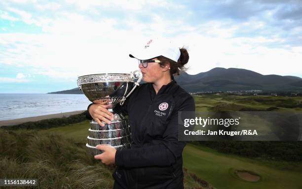 Emily Toy of England poses with the trophy following victory during the final match on day five of the R&A Womens Amateur Championship at Royal...