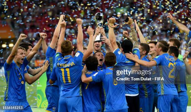 Players of Ukraine celebrate with the trophy after winning the 2019 FIFA U-20 World Cup Final between Ukraine and Korea Republic at Lodz Stadium on...
