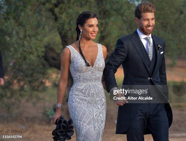 The bride Pilar Rubio and the groom Sergio Ramos pose before the wedding party on June 15, 2019 in Seville, Spain.