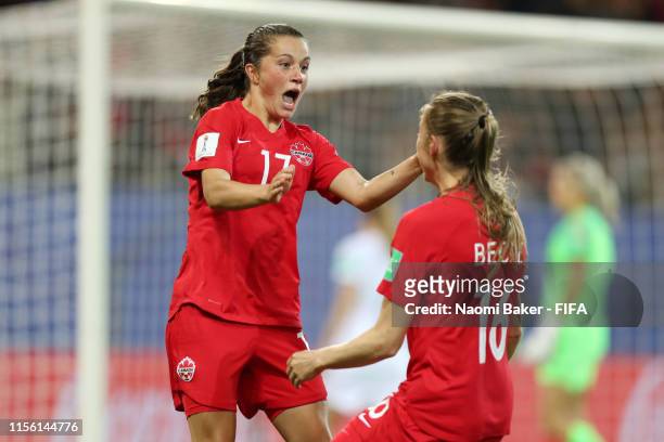 Jessie Fleming of Canada celebrates with teammate Janine Beckie after scoring her team's first goal during the 2019 FIFA Women's World Cup France...