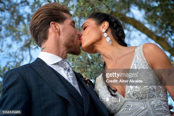 The bride Pilar Rubio and the groom Sergio Ramos pose before the wedding party on June 15, 2019 in Seville, Spain.