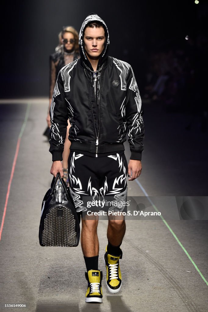 A model walks the runway at the Philipp Plein fashion show during the ...