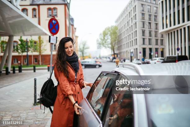 catching a ride share in berlin - car sharing stock pictures, royalty-free photos & images