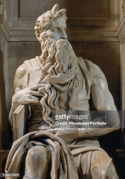 Italy; Lazio; Rome; San Pietro in Vincoli church. Detail. Figure of Moses man beard horns drape drapery the Tables of the Law