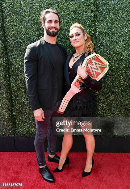 Seth Rollins and Becky Lynch attend the 2019 MTV Movie and TV Awards at Barker Hangar on June 15, 2019 in Santa Monica, California.