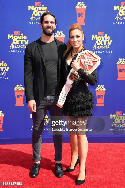 Seth Rollins and Becky Lynch attend the 2019 MTV Movie and TV Awards at Barker Hangar on June 15, 2019 in Santa Monica, California.