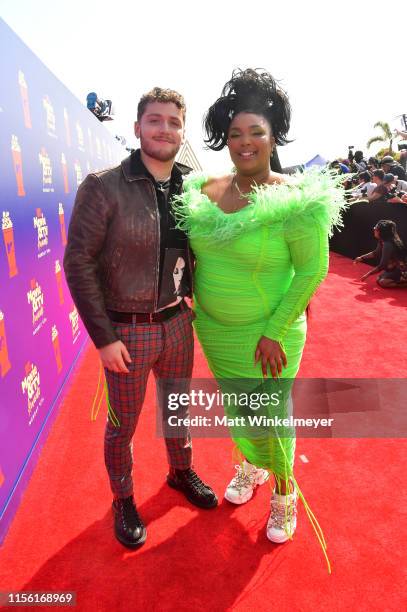 Bazzi and Lizzo attend the 2019 MTV Movie and TV Awards at Barker Hangar on June 15, 2019 in Santa Monica, California.