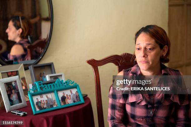 Alba Bencosme speaks during an interview with AFP after her daughter died of Dengue fever in Santo Domingo on July 13, 2019. - An outbreak of dengue...