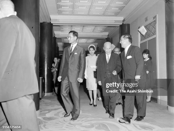 King Bhumibol and Queen Sirikit of Thailand are seen on arrival at the Kabuki-za Theatre on May 28, 1963 in Tokyo, Japan.