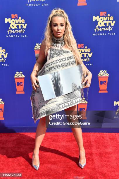 Tana Mongeau attends the 2019 MTV Movie and TV Awards at Barker Hangar on June 15, 2019 in Santa Monica, California.