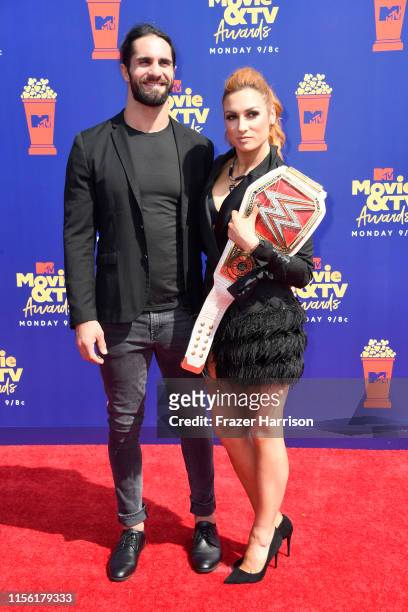 Seth Rollins and Becky Lynch attend the 2019 MTV Movie and TV Awards at Barker Hangar on June 15, 2019 in Santa Monica, California.