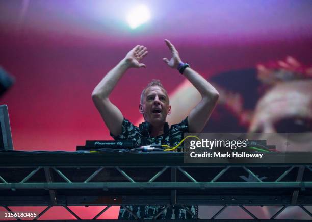 Fat Boy Slim performs on stage during Isle of Wight Festival 2019 at Seaclose Park on June 15, 2019 in Newport, Isle of Wight.