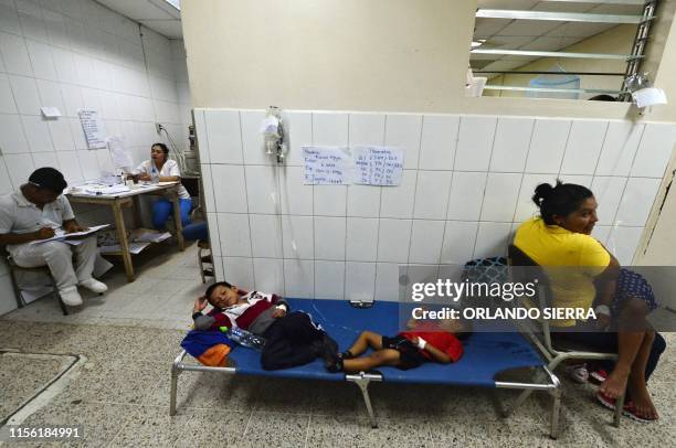 Children presumed to be infected with dengue, which vector is the Aedes aegypti, are assisted at the Roberto Suazo Cordova Hospital, in La Paz...