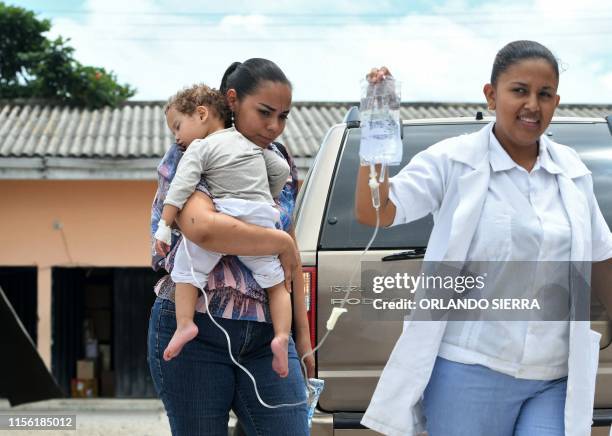 Toddler presumed to be infected with dengue, which vector is the Aedes aegypti, is assisted at the Roberto Suazo Cordova Hospital, in La Paz...
