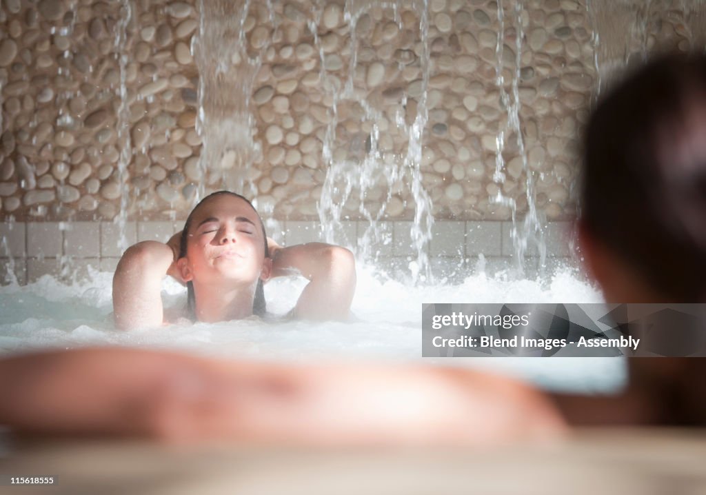 Woman enjoying hydrotherapy treatment