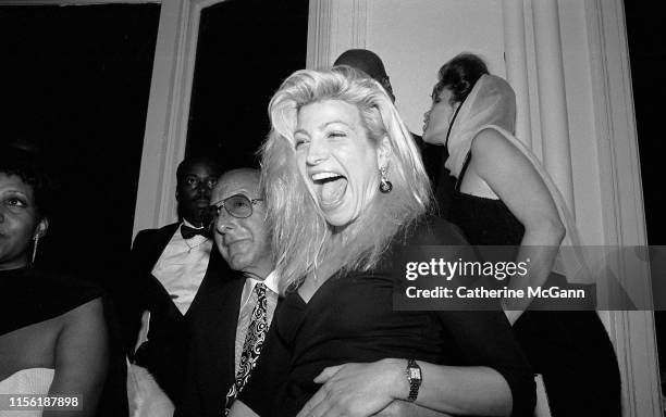 American record producer and music industry executive Clive Davis and Taylor Dayne at a party in July 1989 in New York City, New York.