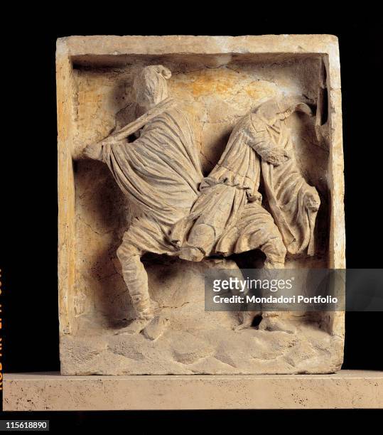 Italy; Puglia; Taranto; Taranto; National Archaeological Museum. Whole artwork. Metope figures Asian costume trousers imation beret/cap Phrygian sword