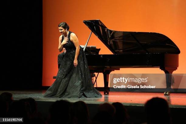 Anna Netrebko performs at the Anna Netrebko recital and charity dinner during the "Munich Opera Festival 2019" at Nationaltheater on July 17, 2019 in...