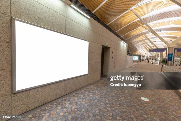 blank billboard in pudong airport,shanghai - airport billboard stock-fotos und bilder