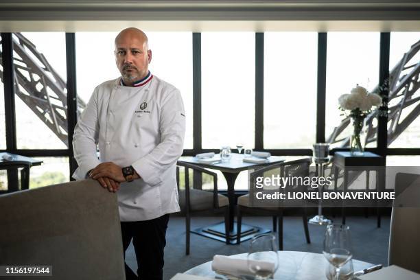 Starred French chef Frederic Anton poses during a photo session at the "Le Jules Verne" restaurant at the Effeil Tower in Paris on July 15, 2019. -...