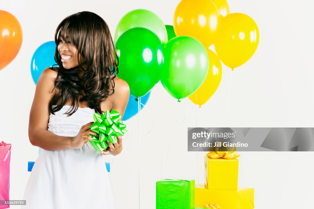 African American woman with birthday presents