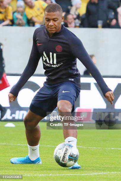 Kylian Mbappe of Paris Saint-Germain controls the ball during the pre-season friendly match between Dynamo Dresden and Paris Saint-German at...