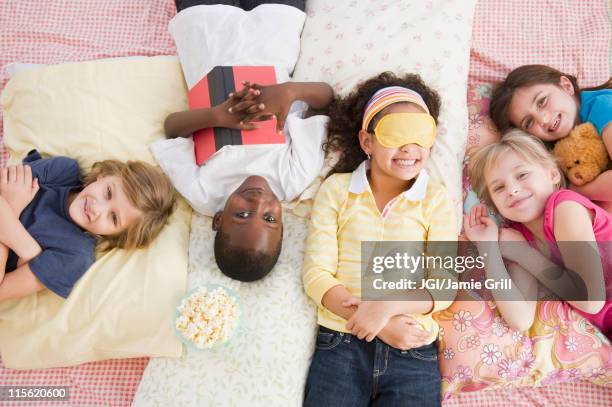 children having slumber party together - boys sleepover stock pictures, royalty-free photos & images