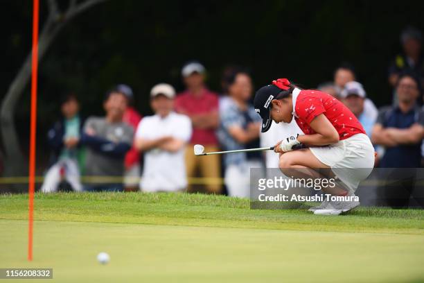Yui Kawamoto of Japan reacts after missing a putt on the 15th green during the final round of the Ai Miyazato Suntory Ladies Open Golf Tournament at...