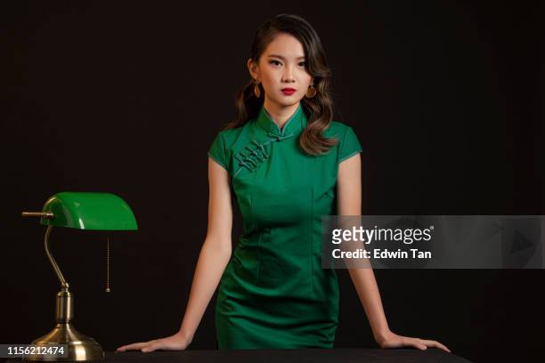 studio portrait shoot with vintage shanghai theme asian chinese female model - chinese model stock pictures, royalty-free photos & images
